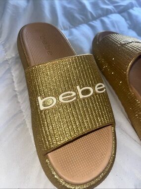 bebe Metallic Gold Logo Slide Sandals sz 7 barely worn maybe twice indoors.